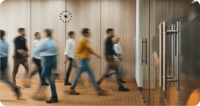 a group of people standing in a room